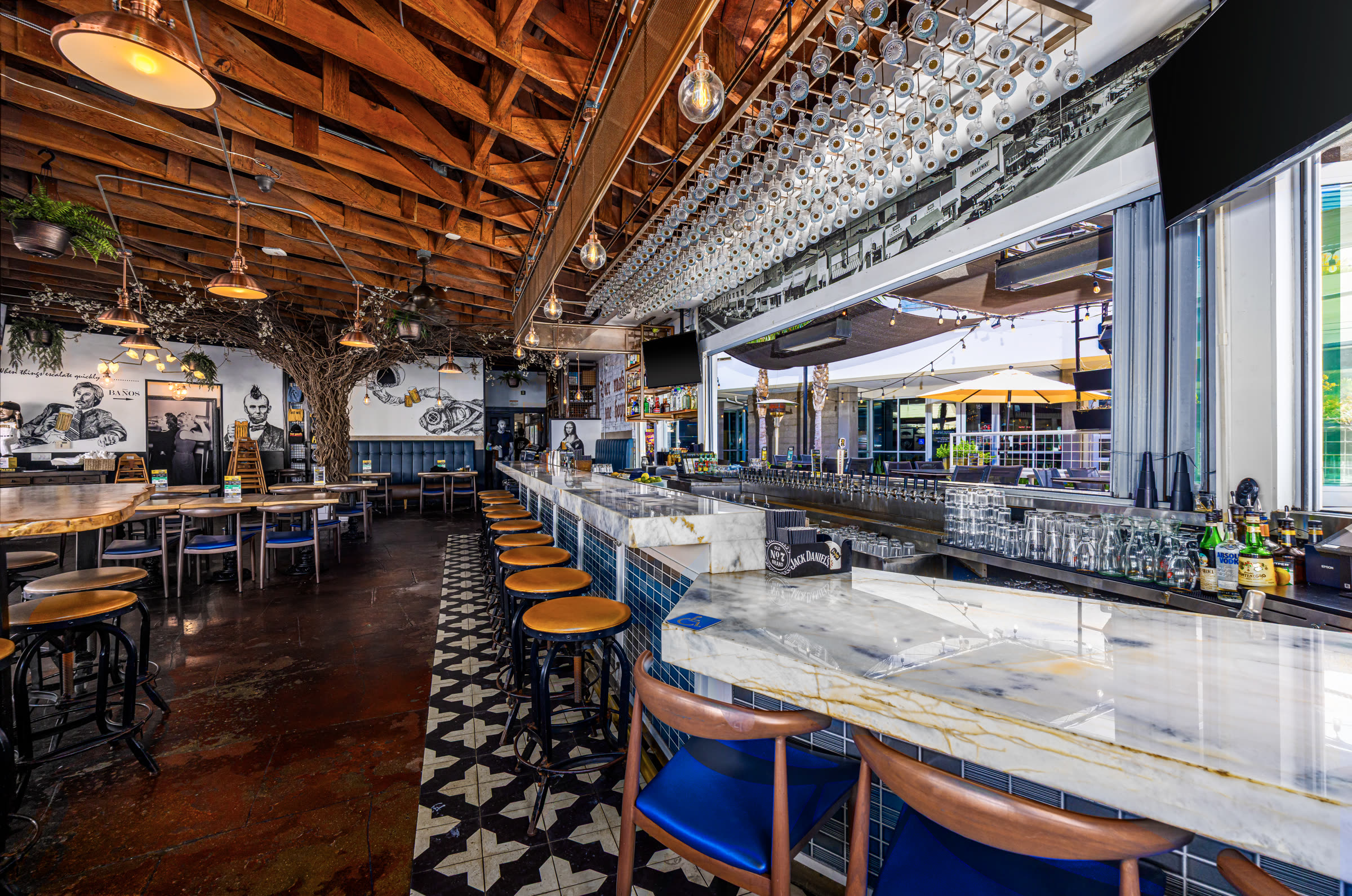 The marble bar and blue-tiled counter at Bier Garden Encinitas