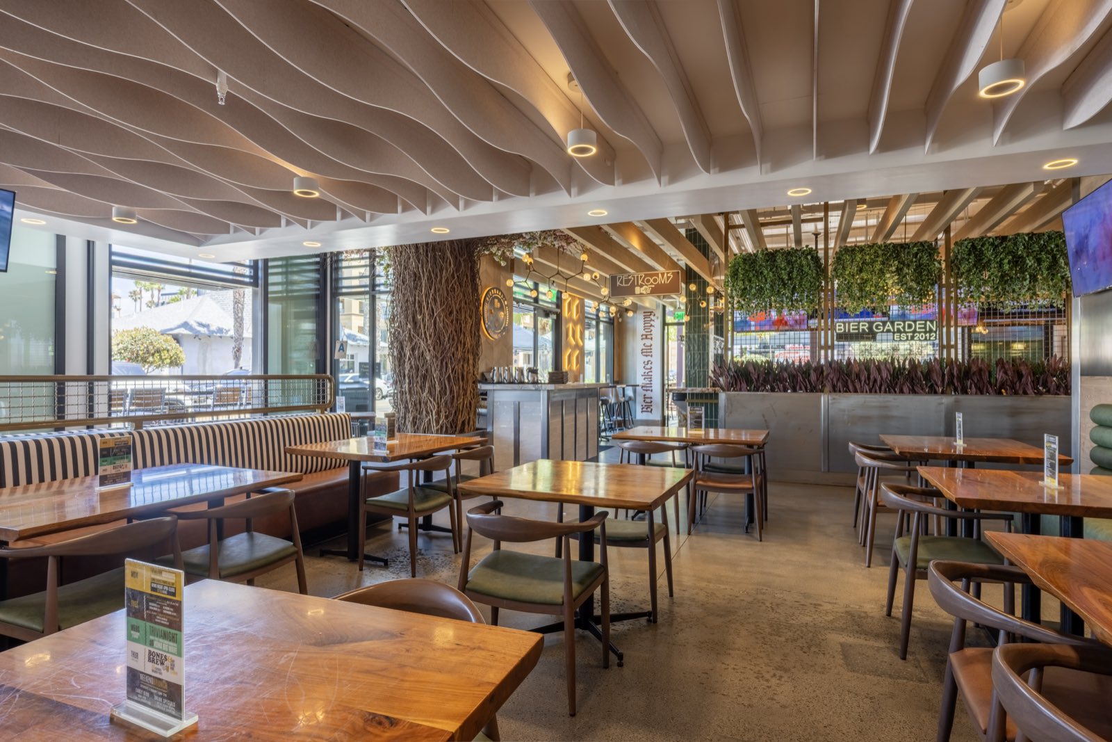 Indoor dining room with booth and table seating