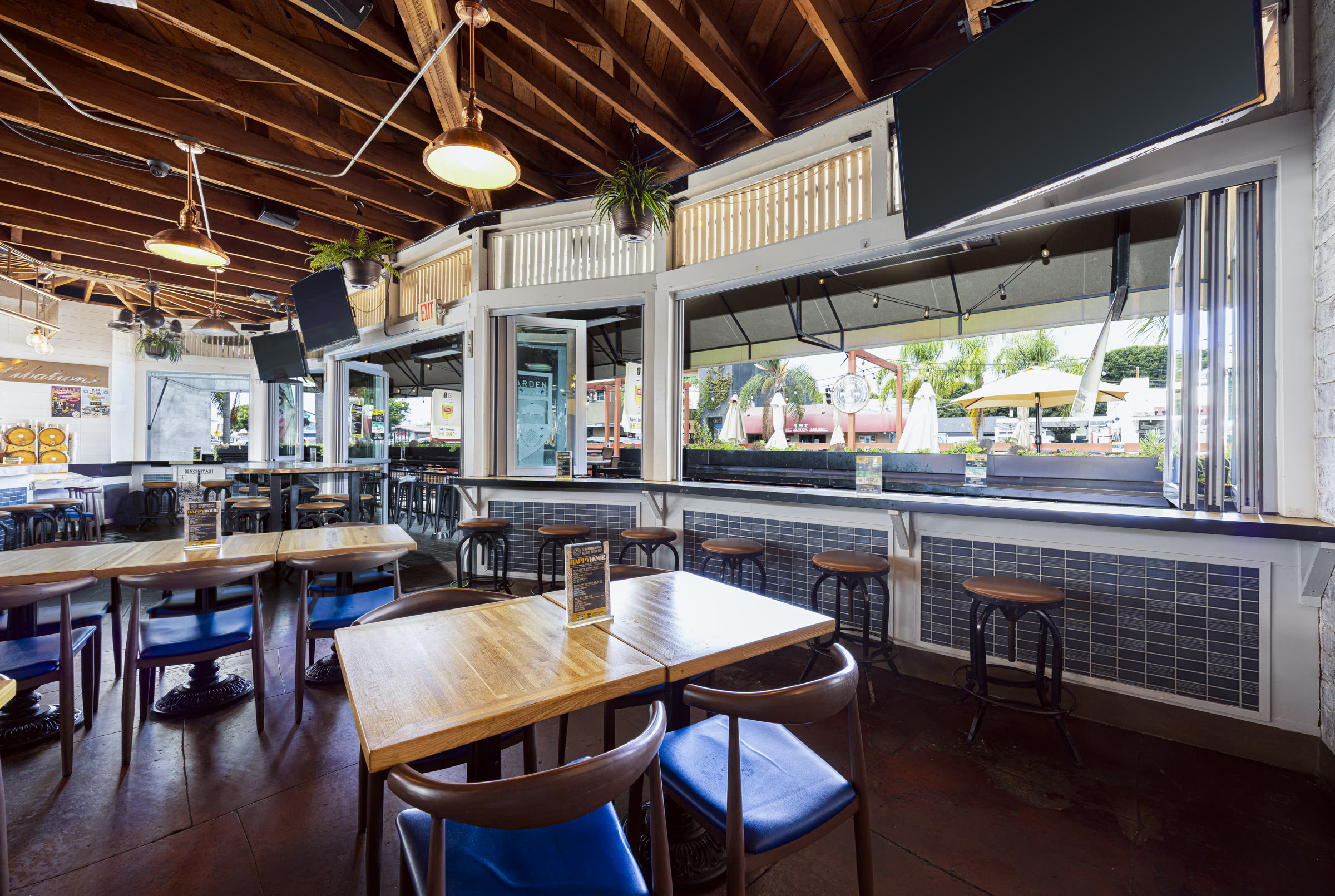 Inside Bier Garden Encinitas: bright dining by the open windows