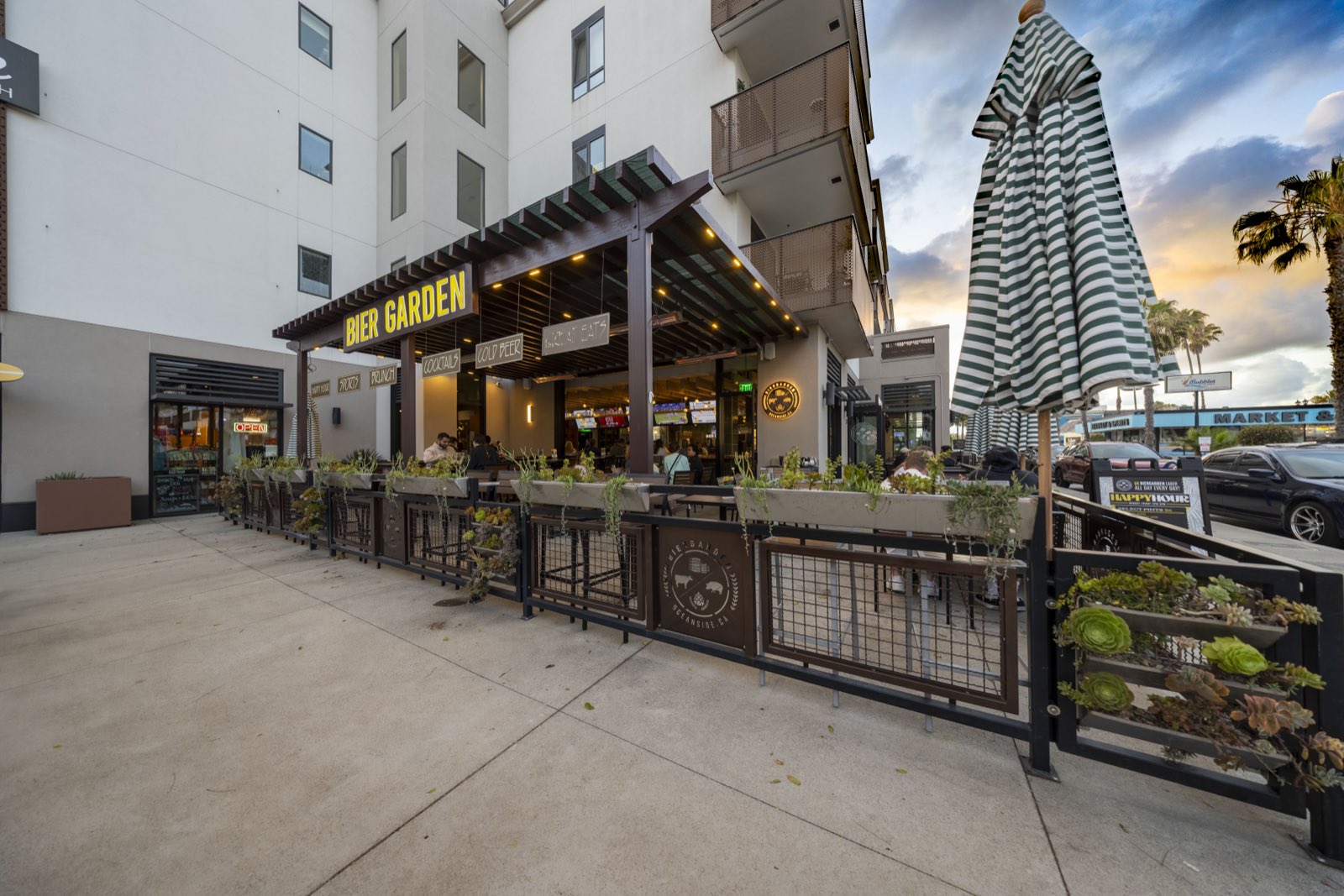 The patio along Cleveland Street at sunset